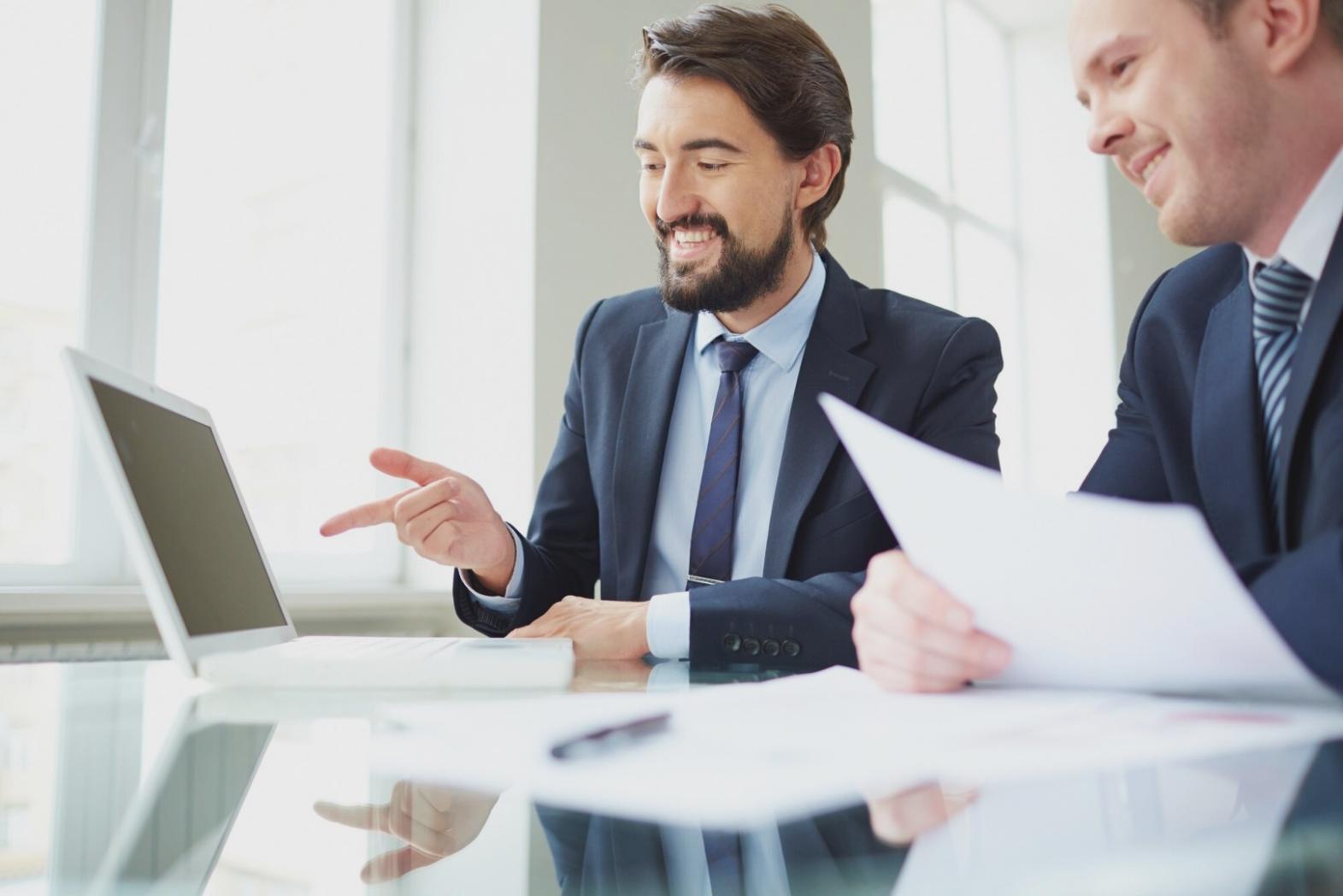 Startup founders collaborating on fundraising strategy